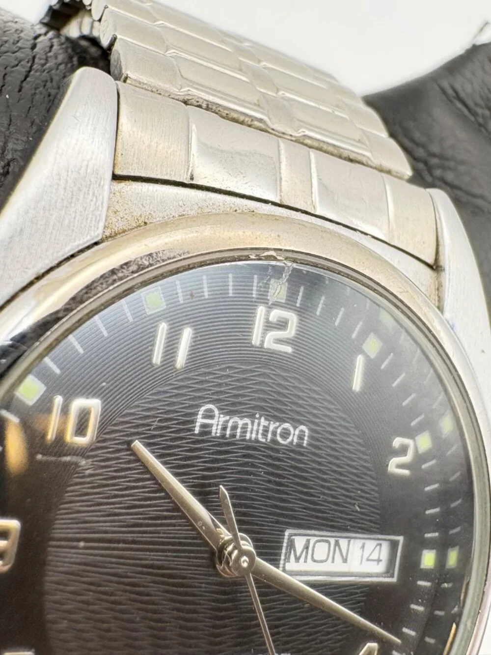 Armitron Mens Watch 20/1143SV Black Textured Dial Day Date Expansion Band 35mm